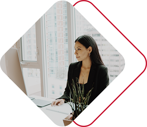 Woman in Black Working in Office